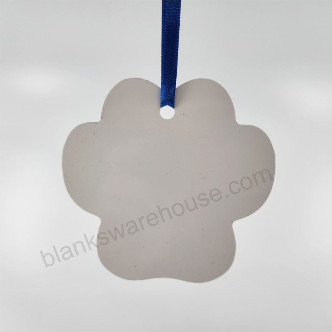 A paw shaped aluminum plate with one hole