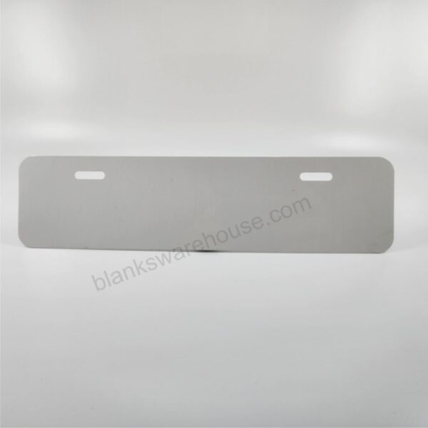 A license plate shaped aluminum plate with two holes