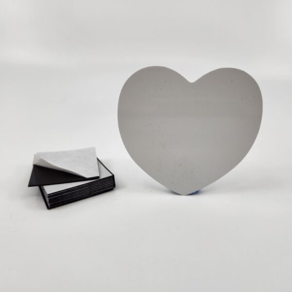 A Heart Shape Aluminum plate with some magnet