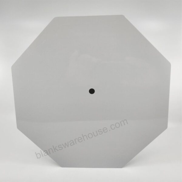 A hexagonal shaped aluminum plate with one hole
